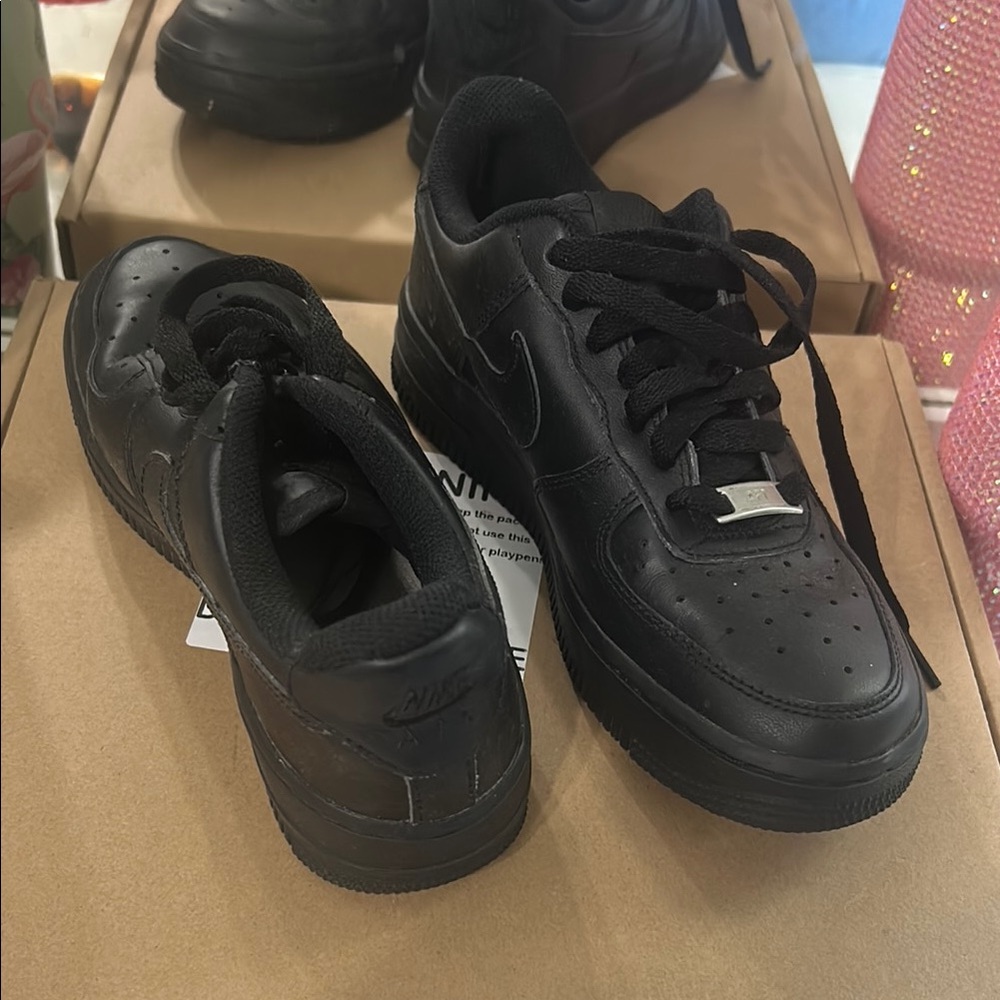 Nike All-Black Leather Sneakers